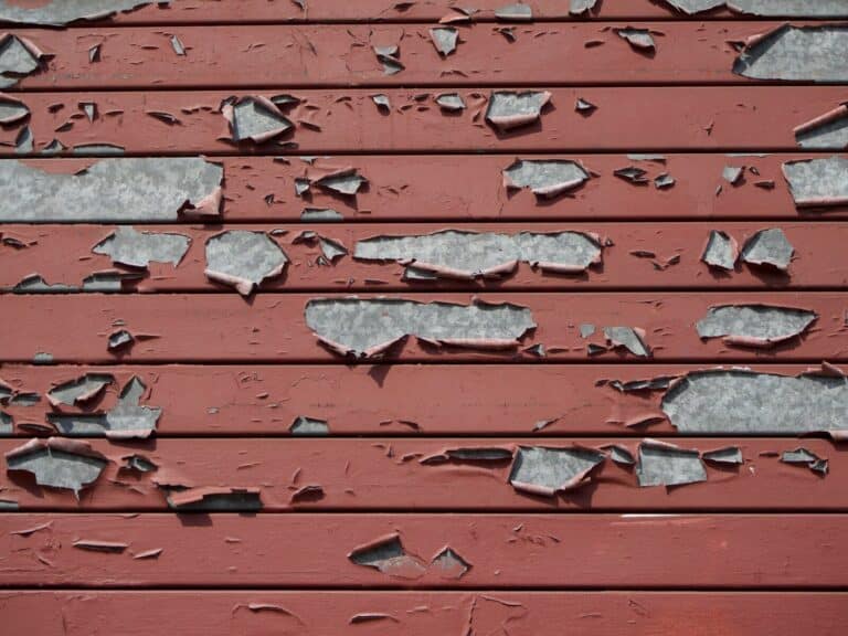 gray and red metal wall